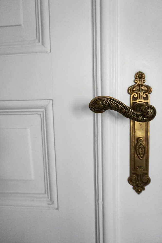 stunning vintage door handle in period feature filled Berlin airbnb Apartment